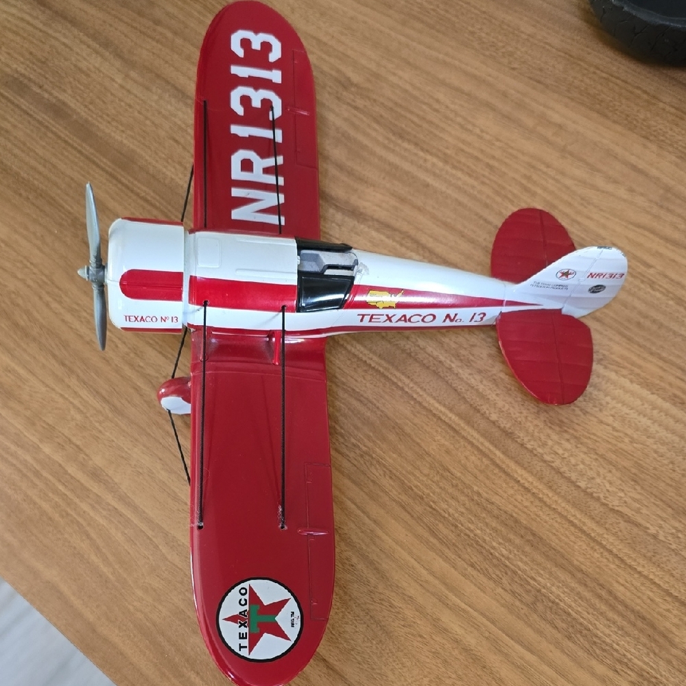 Red and White Toy Airplane Coin Slot On Top